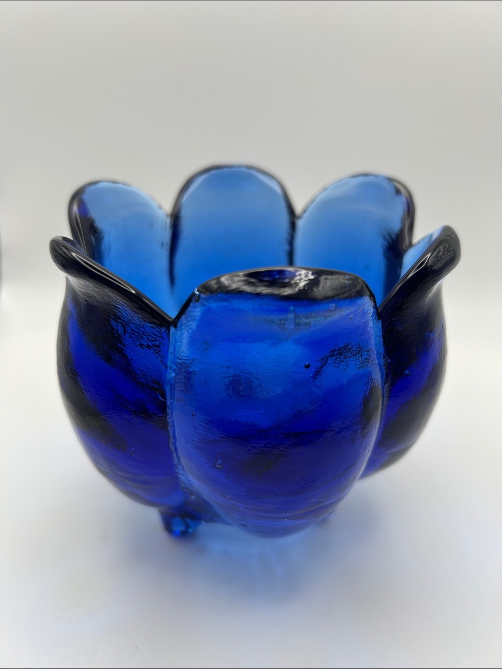Vintage footed Blue Glass Flower Bowl no chips or cracks. 4”high 4.25”wide.